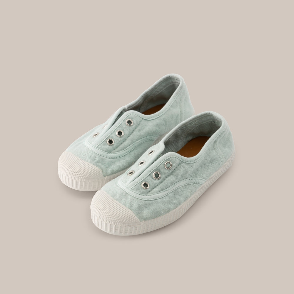 Chaussure en toile à bout en caoutchouc