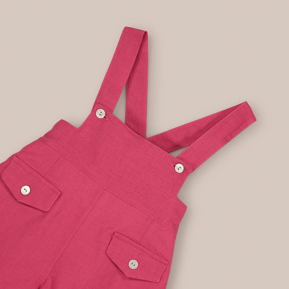 Pantaloni con bretelle magenta