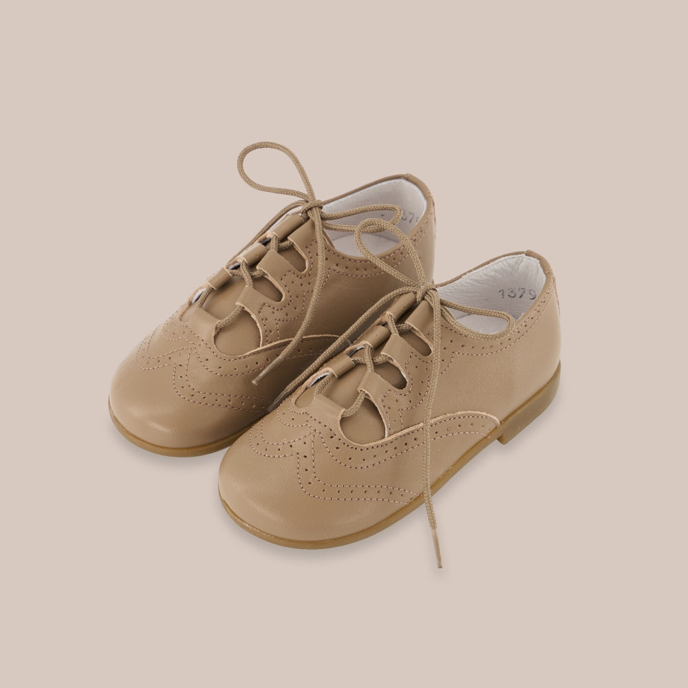 Pompadour en cuir anglais