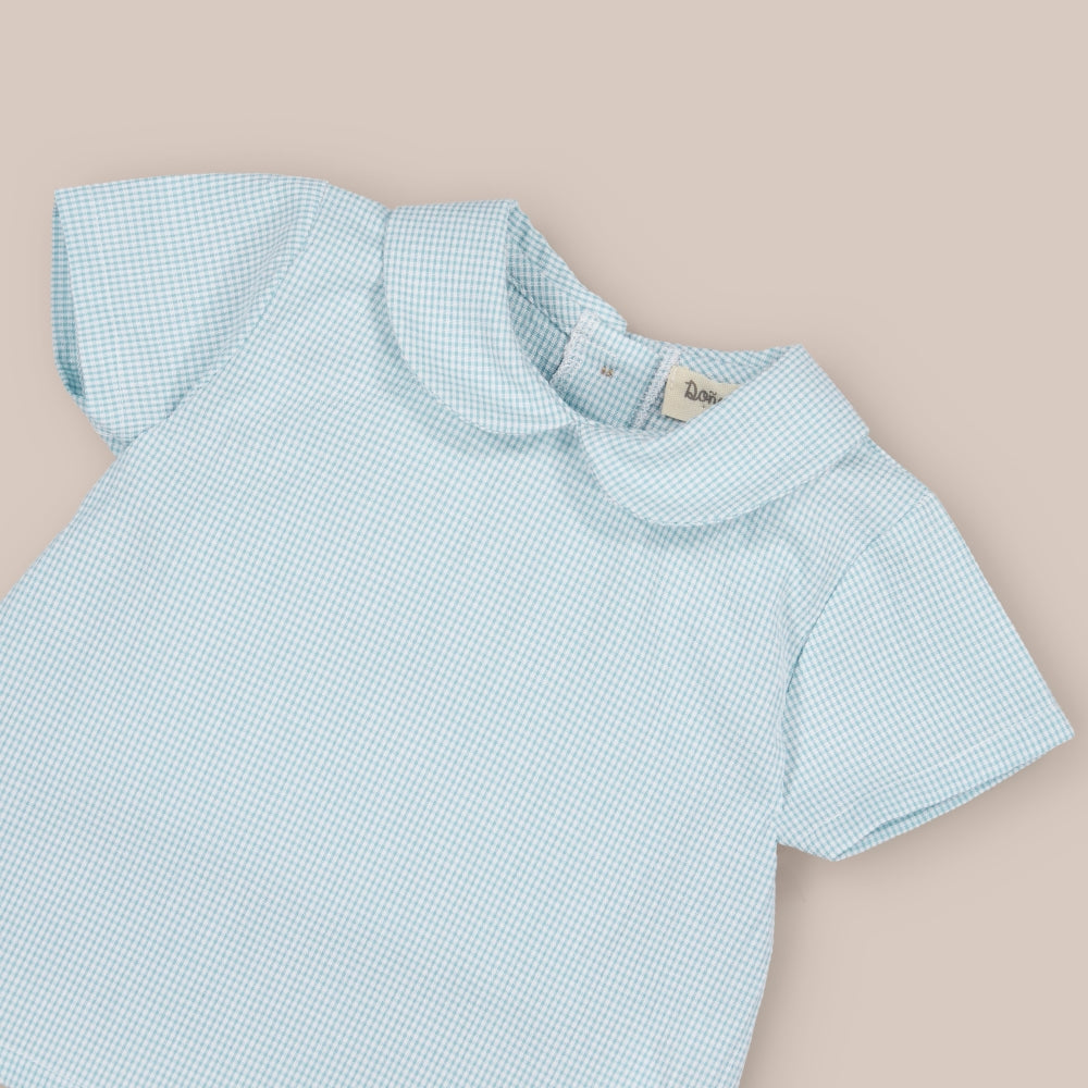 Camisa de bebê turquesa