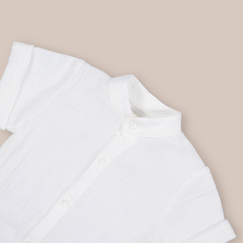 Camicia a maniche corte con pompon