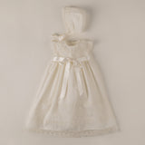 Skirt of christening With hood between them