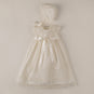 Skirt of christening With hood between them