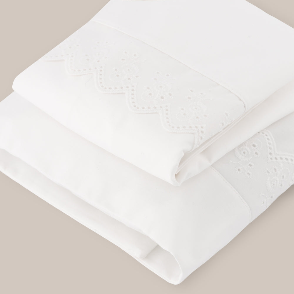 Conjunto de lençóis de berço